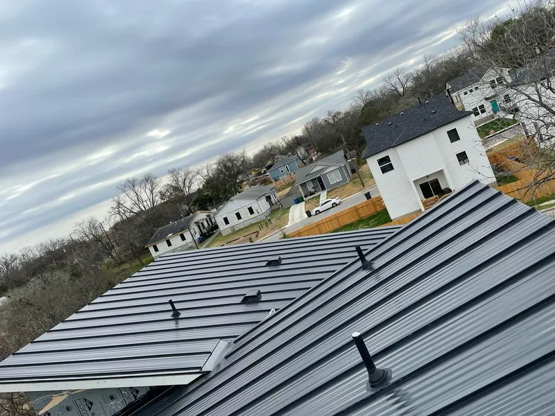 Standing seam metal roof panels with vents for Skylight Repair in Trumbull